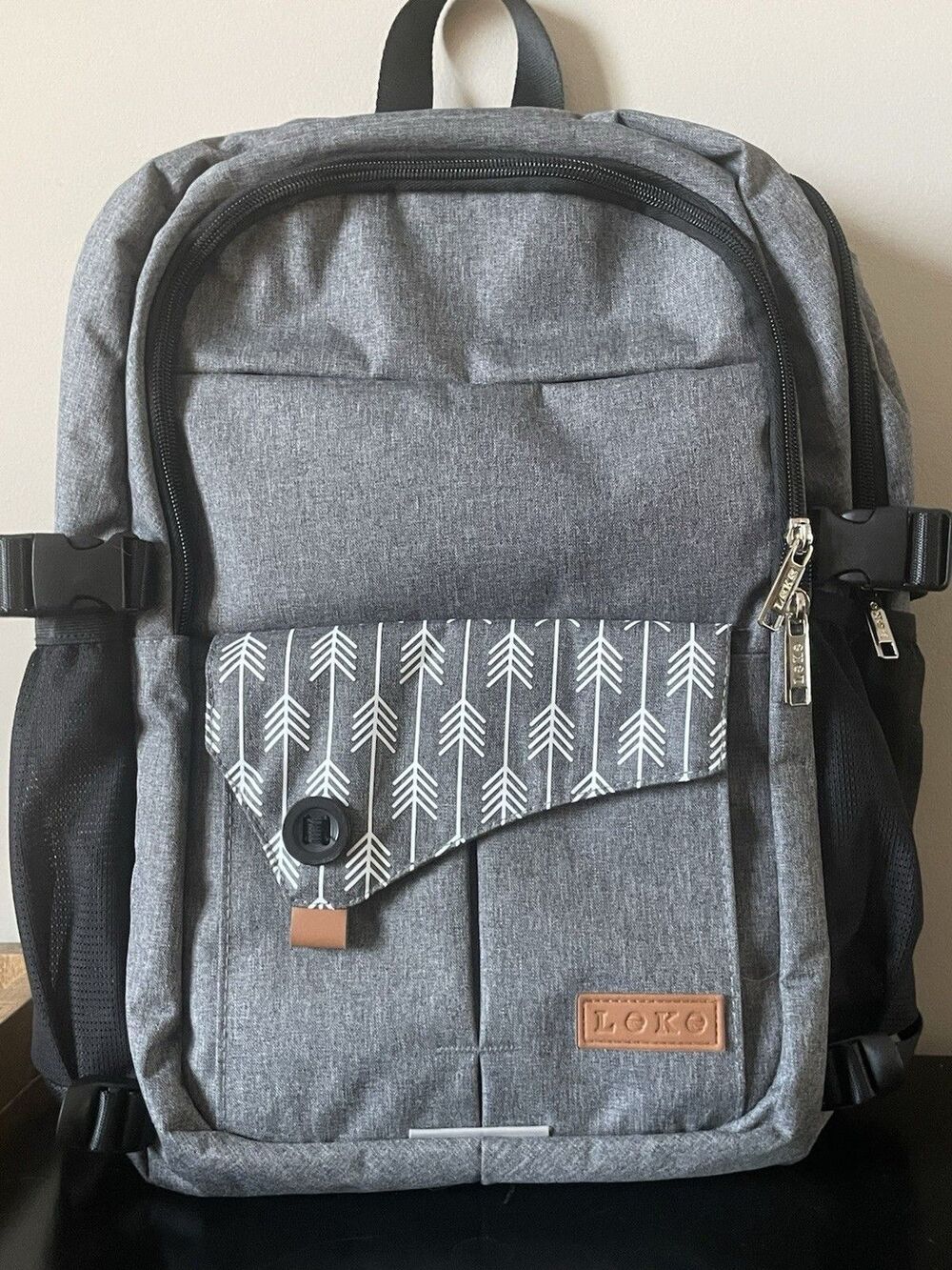 Leke Backpack  in Grey with Arrow Print many compartments- New Without Tags